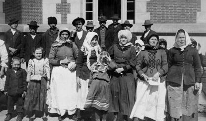 group of immigrants men women and children