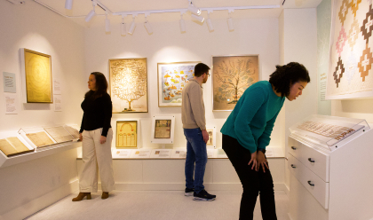visitors viewing an exhibit