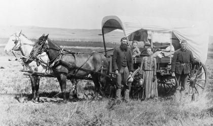 Family with Their Covered Wagon During the Great Western Migration