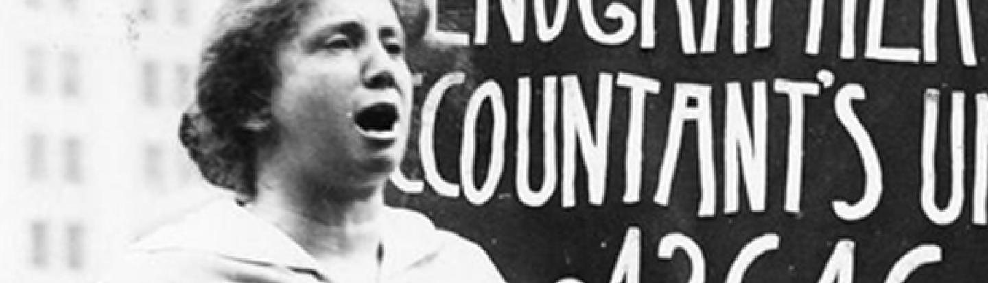 Vintage photo of activist giving a speech outdoors at a podium