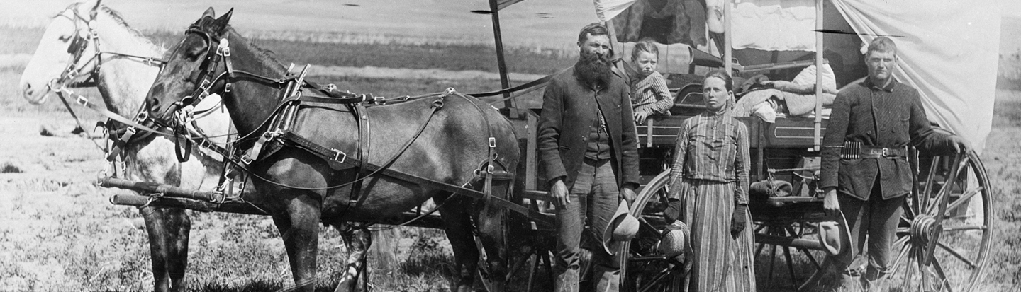 Family with Their Covered Wagon During the Great Western Migration