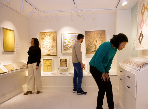 visitors viewing an exhibit