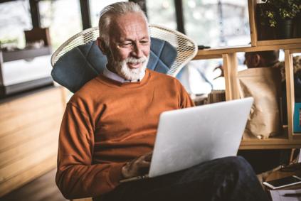 Researcher uses laptop at home