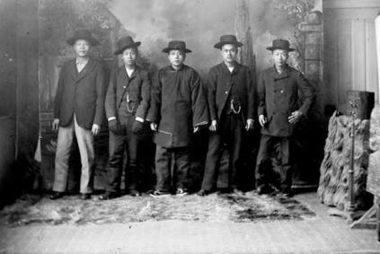 Black and white photo of five young Chinese American men