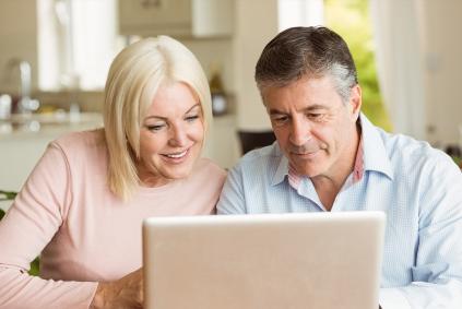 two people on laptop